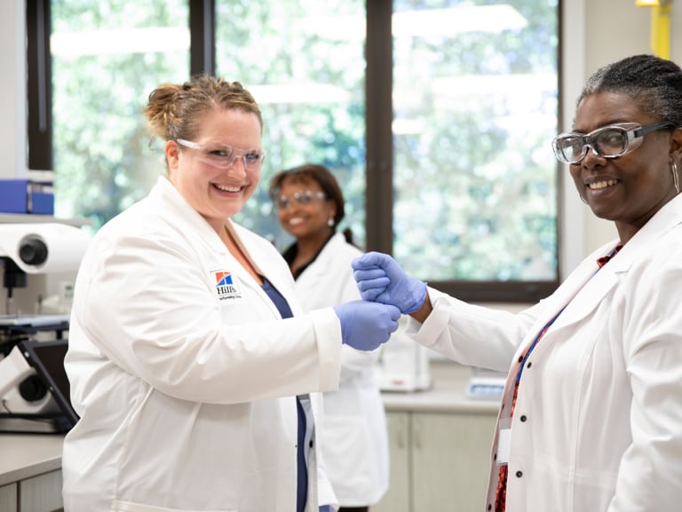 scientists smiling 