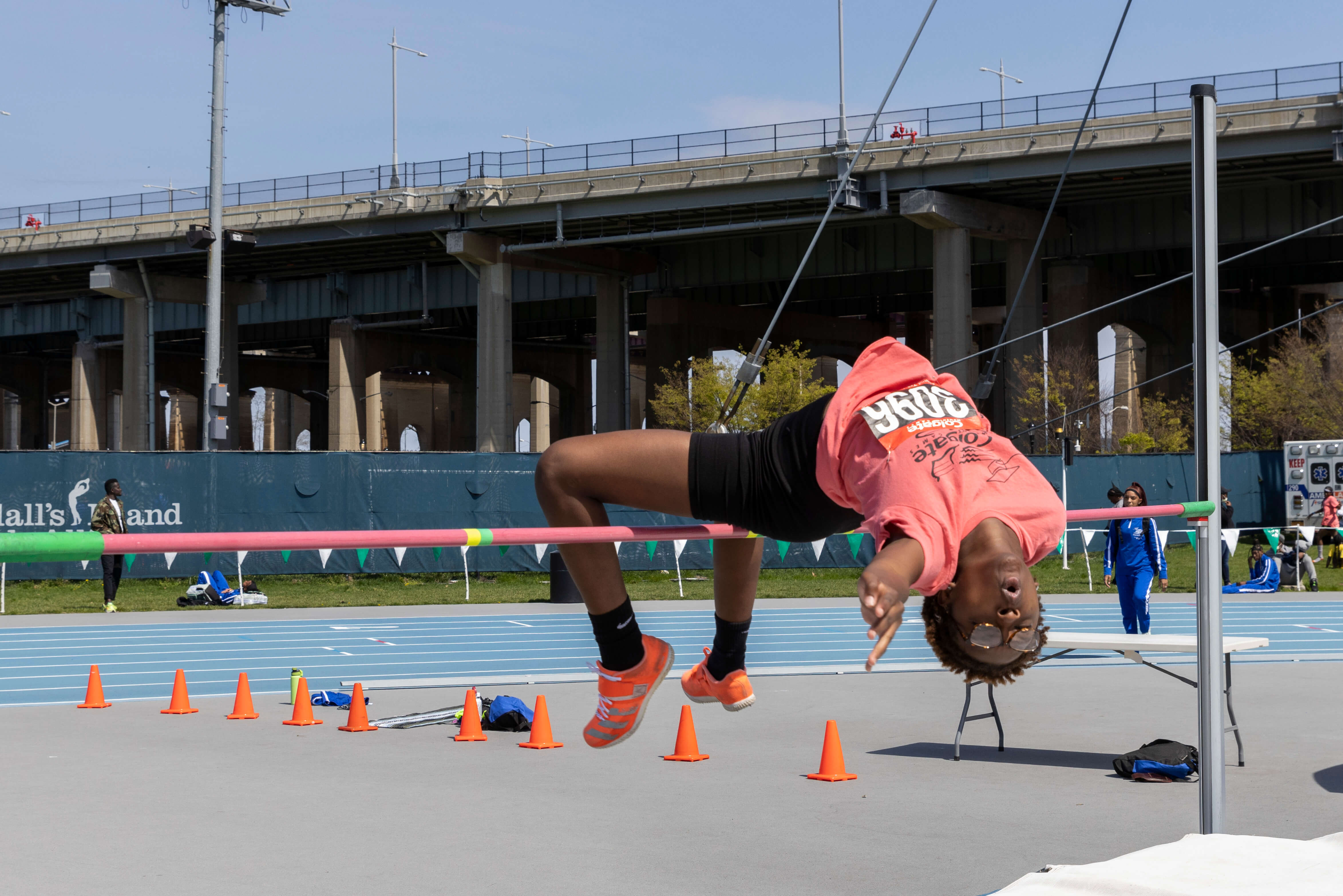 Athletes compete in high jump at Colgate Women's Games in New York City.