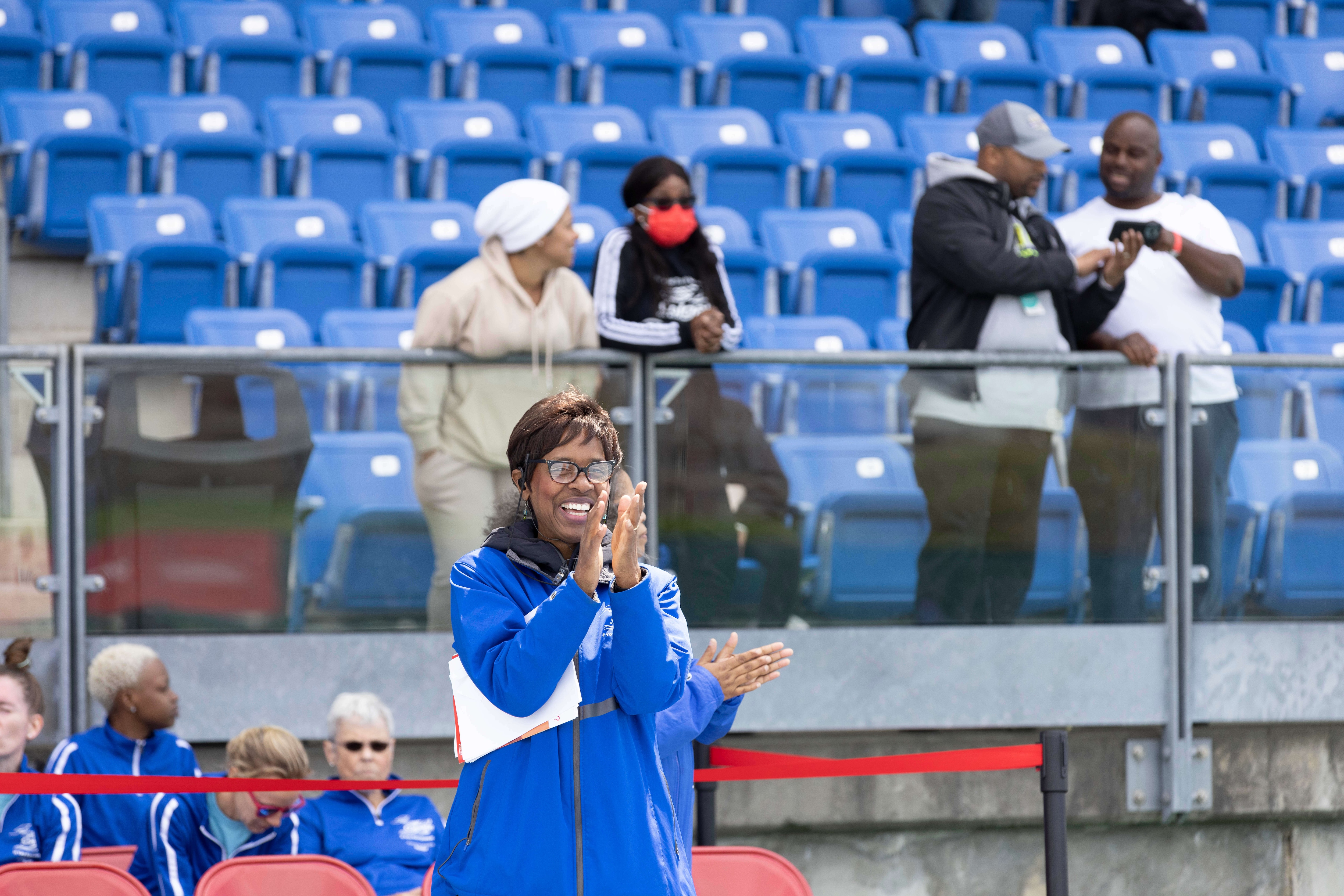 Cheryl Toussaint cheers for athletes at the Colgate Women's Games.
