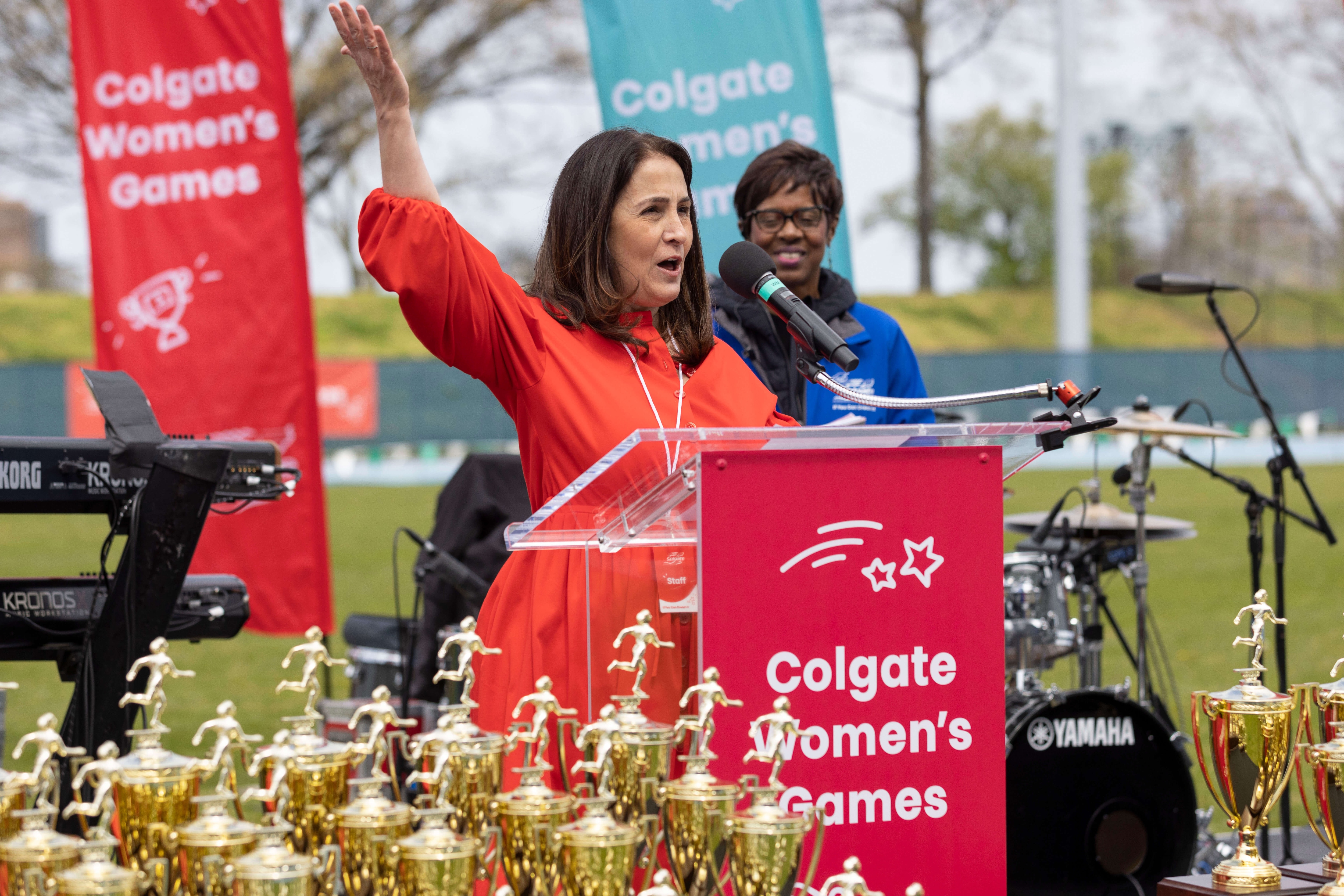 Jennifer Daniels, Colgate's Chief Legal Officer, gives opening remarks at the Colgate Women's Games 47th Season Finals.