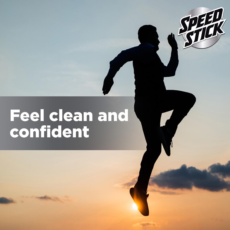Silhouette of a man jumping energetically against a sunset sky. Overlaid text on a gray banner reads, "Feel clean and confident," with the Speed Stick brand logo in the upper right.