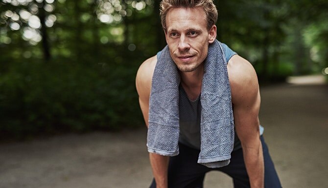 Man with a towel around his neck