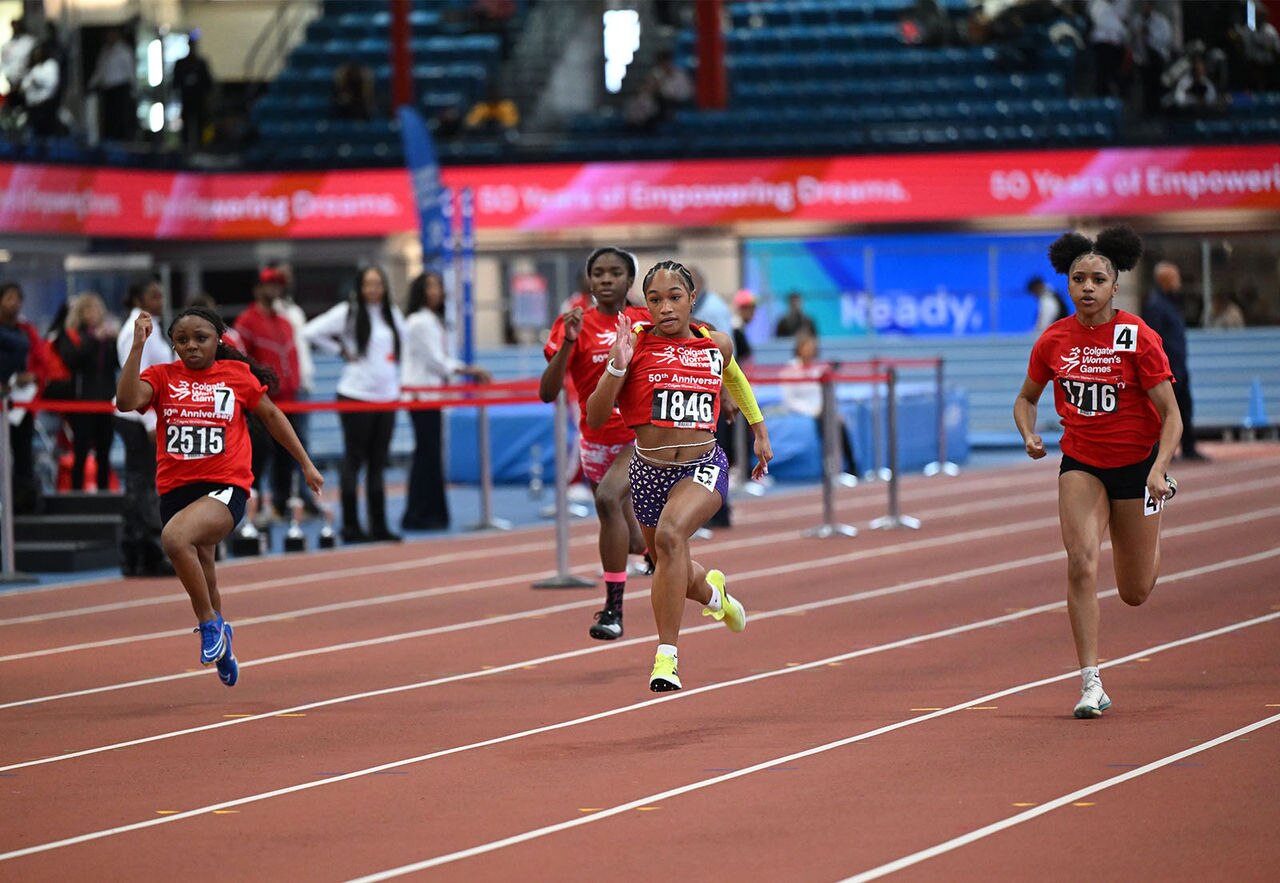Athletes compete in a fierce sprint race during the Colgate Women's Games at The Armory indoor track.