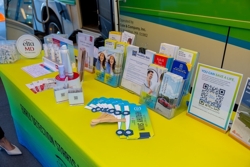 EltaMD sunscreens and skin cancer brochures on a Destination Healthy Skin table.