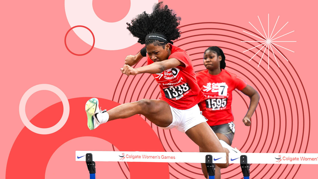 Woman jumping over an athletic hurdle