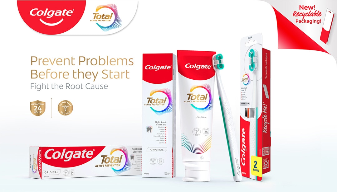Colgate Total Active Prevention brush set and toothpaste tube along with their recyclable paper boxes.